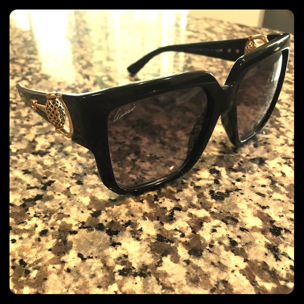 A pair of authentic Gucci sunglasses